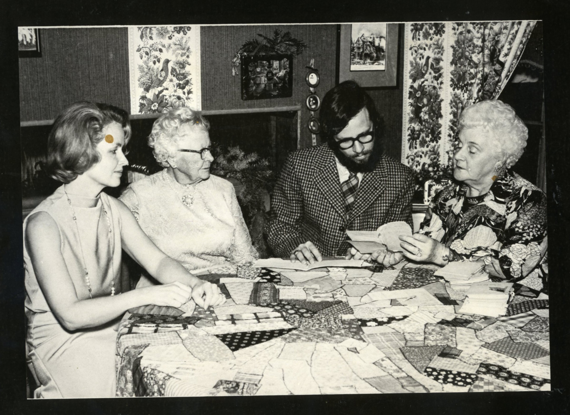 George Elliot Club, December 1974. Left to right: Virginia Mastin, Mabel Lyman, Lawrence Pizer and Helen Clance. Courtesy of Adams County Historical Society.
