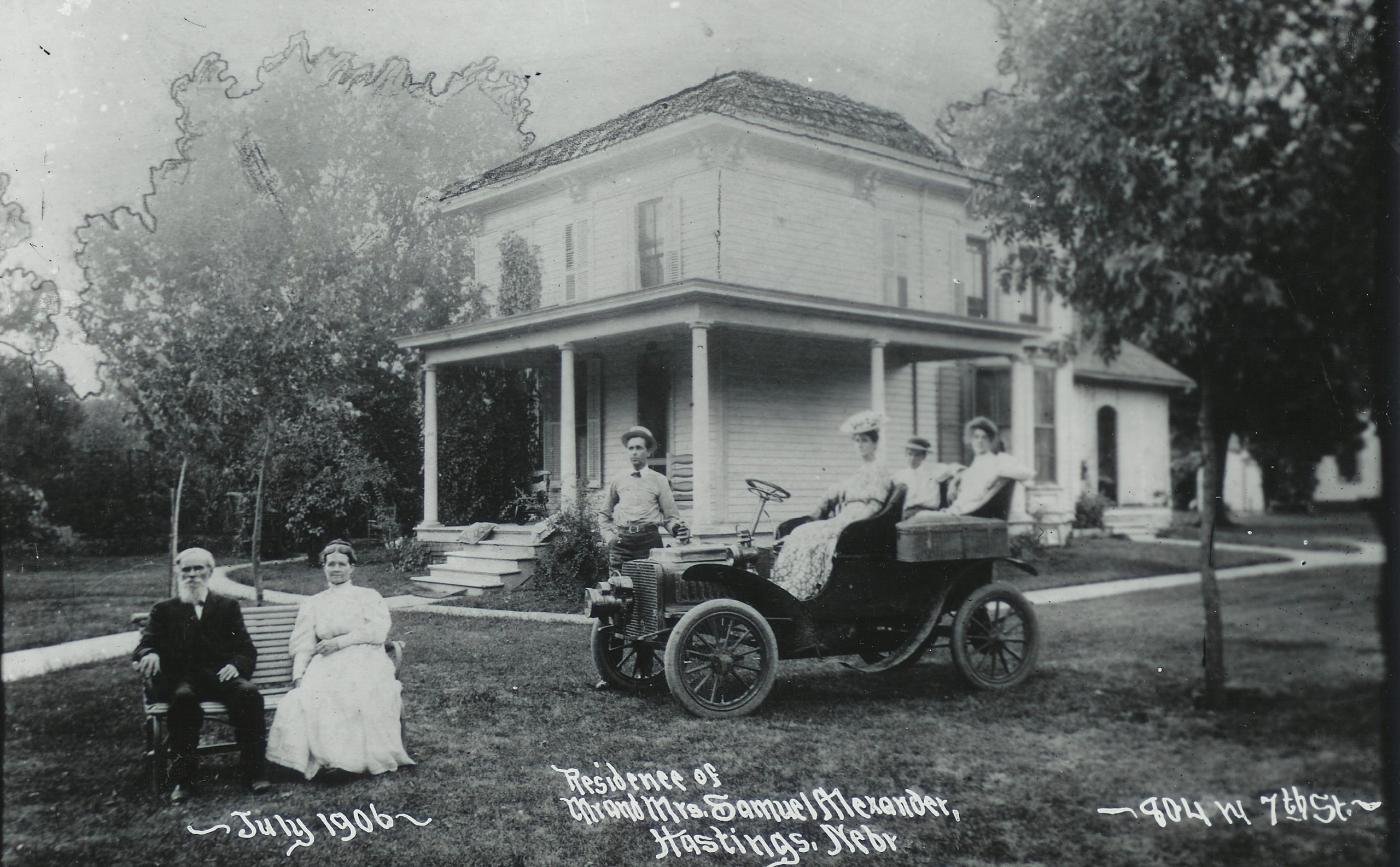 Mr. & Mrs. Alexander on bench, in front of their home, 1906. Courtesy of Adams County Historical Society.