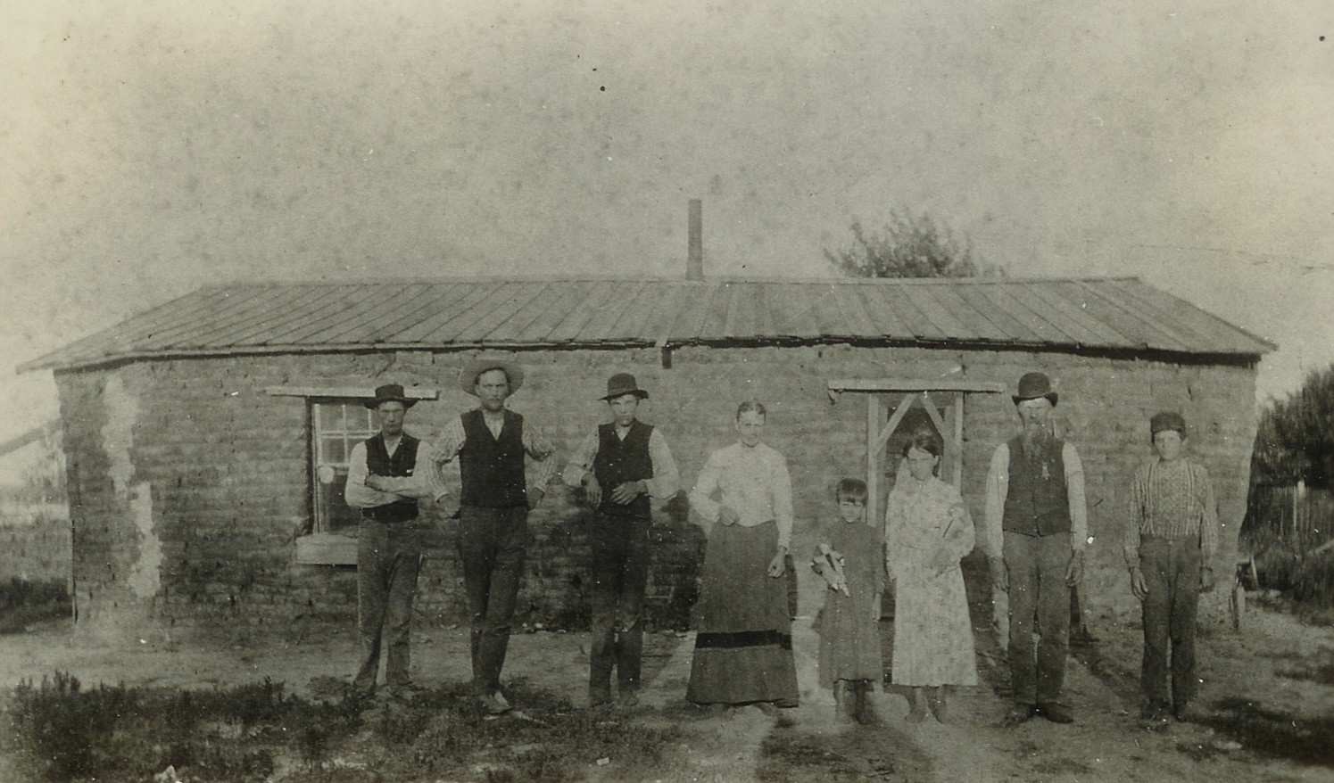Sod house and family, 1874. Courtesy of Adams County Historical Society.