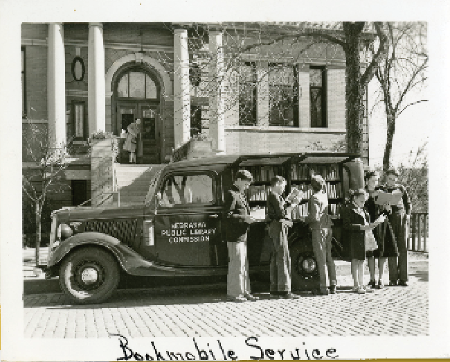 Children with bookmobile, 1940s. Courtesy Hastings Public Library.